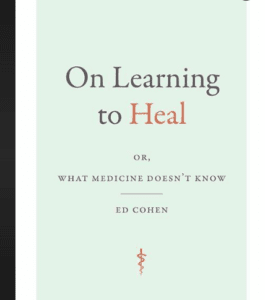 On Learning to Heal: What Medicine Doesn't tell us words on blue book cover. 
