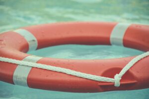 Image of a life preserver in the pool water